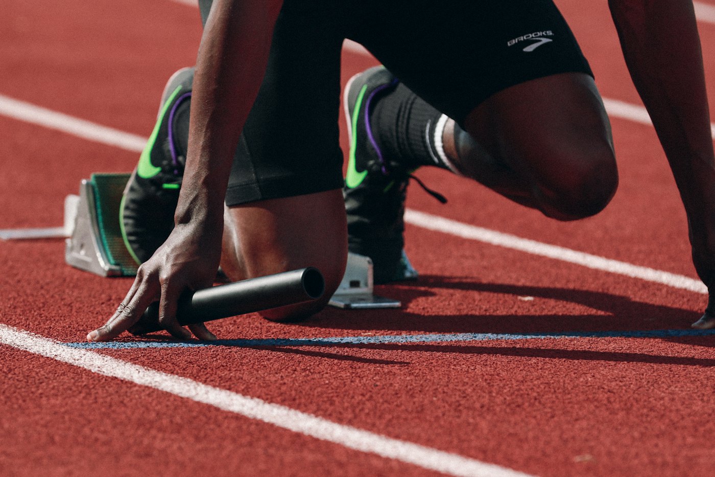 Young athlete sprinting on a track